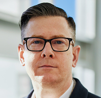 Kriptókereskedési vállalat ügyvezetőjeként dolgozó Alexander Hughes CEO portréja